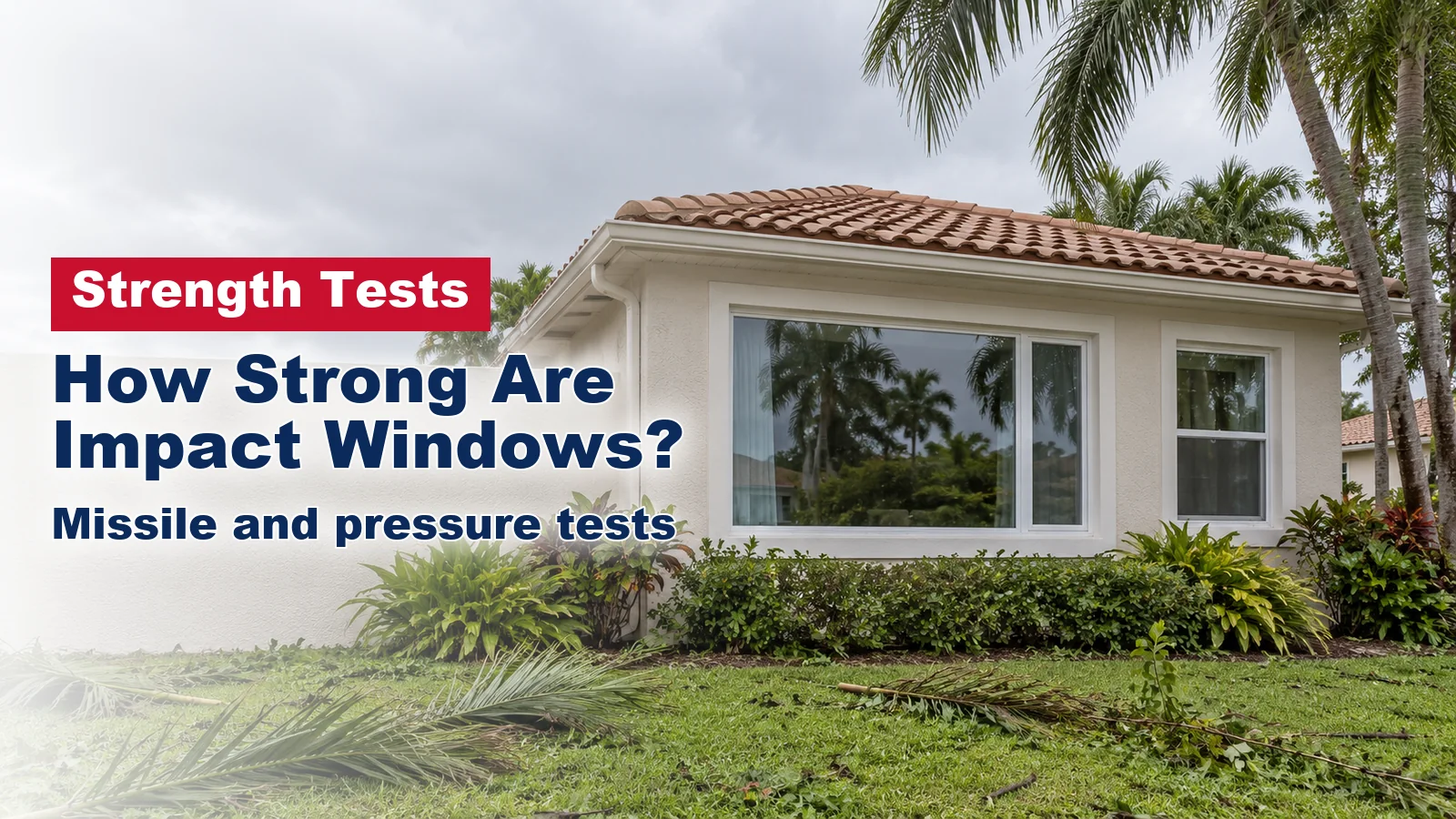 South Florida stucco home with large impact windows and palm fronds on the lawn after a storm