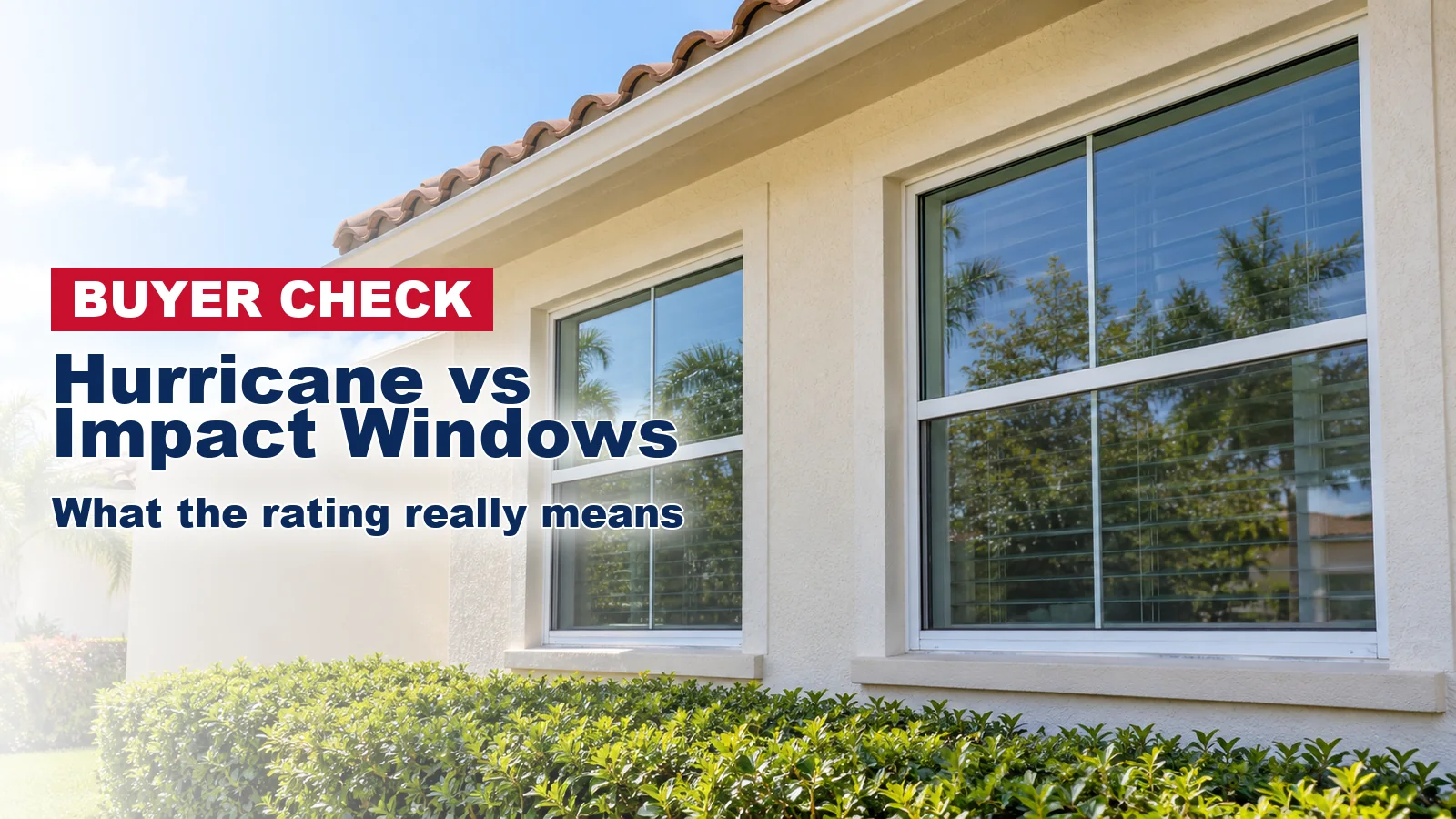 Front windows of a single-story South Florida stucco home on a calm morning.